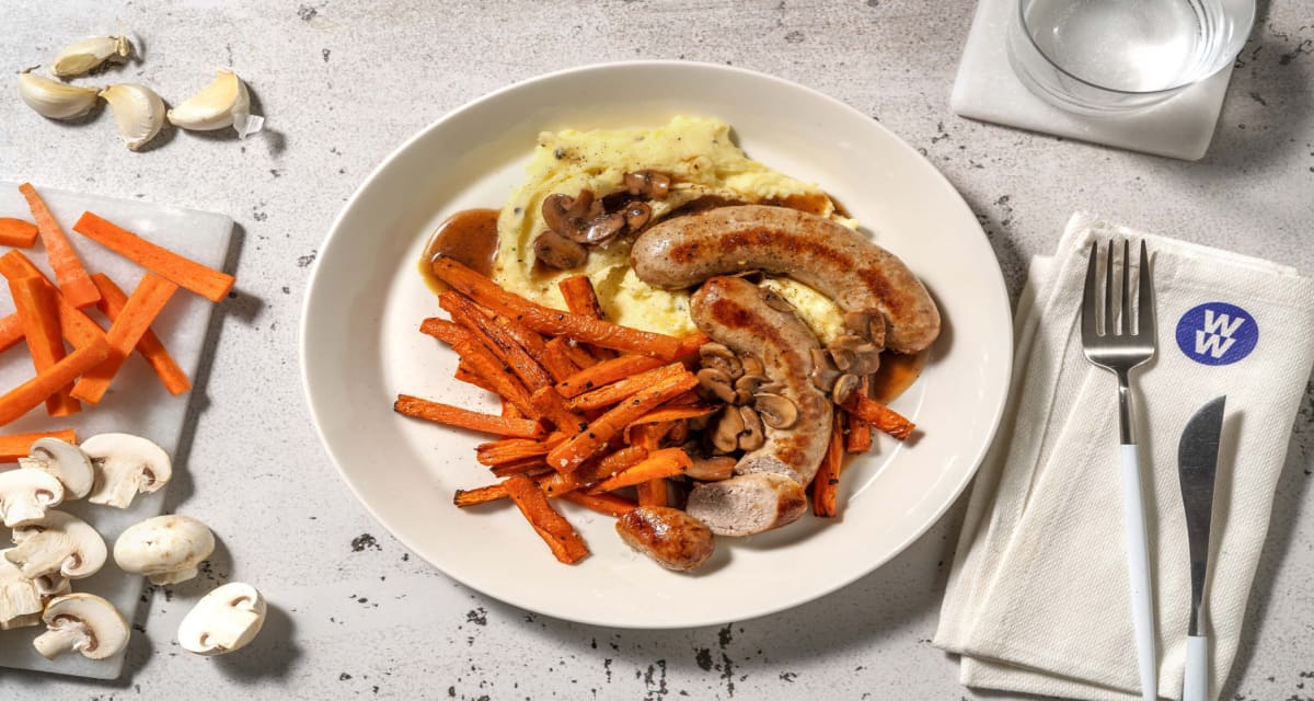 Sausages in Mushroom Sauce with Garlic Mash and Roasted Carrots